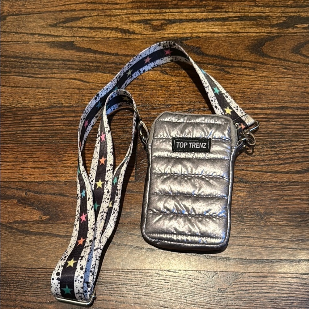 This is a Top Trenz Puffer Cell Bag with an original striped tie-dye strap - Picture 2 of 8